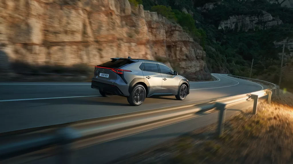 toyota bz4x driving along new plate Large Landscape